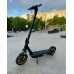 Чорний складаний електросамокат Scooter для міста з амортизацією спереду і посиленою рульовою колонкою